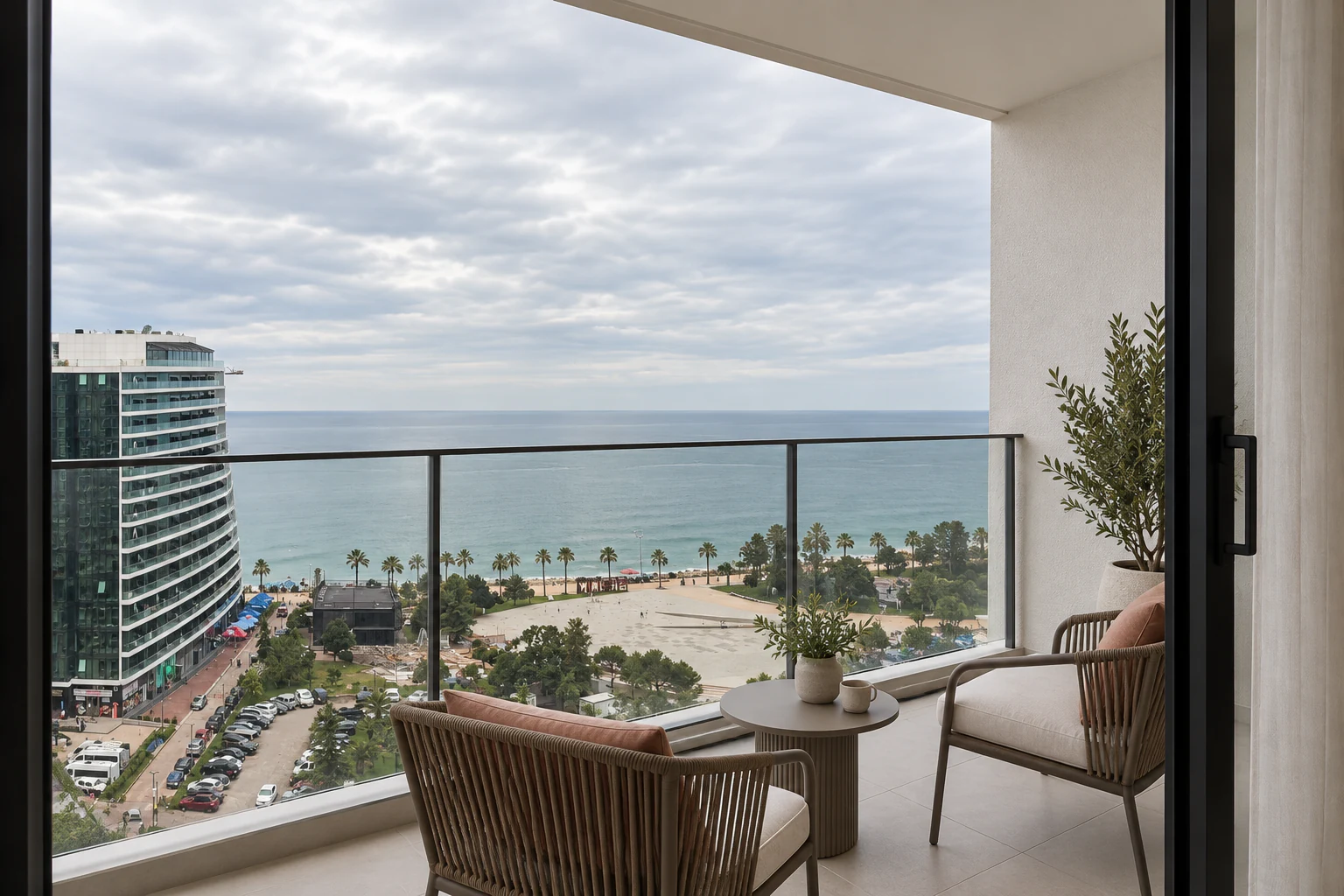 Balcony seating area with panoramic Black Sea and New Boulevard views
