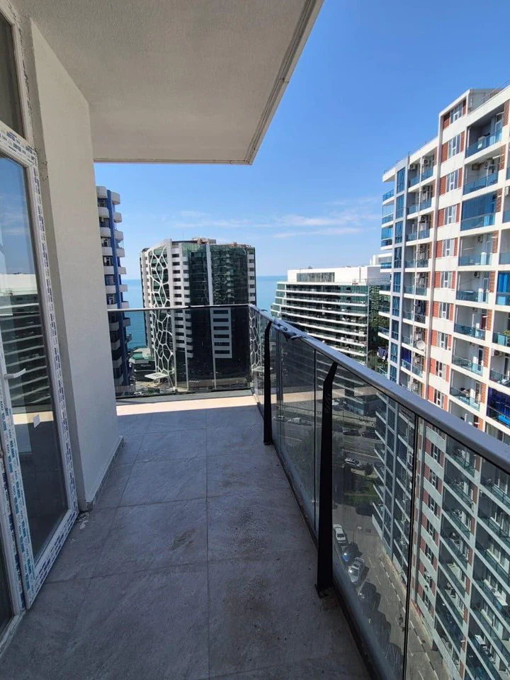 Spacious balcony with partial sea view in Royal Residence